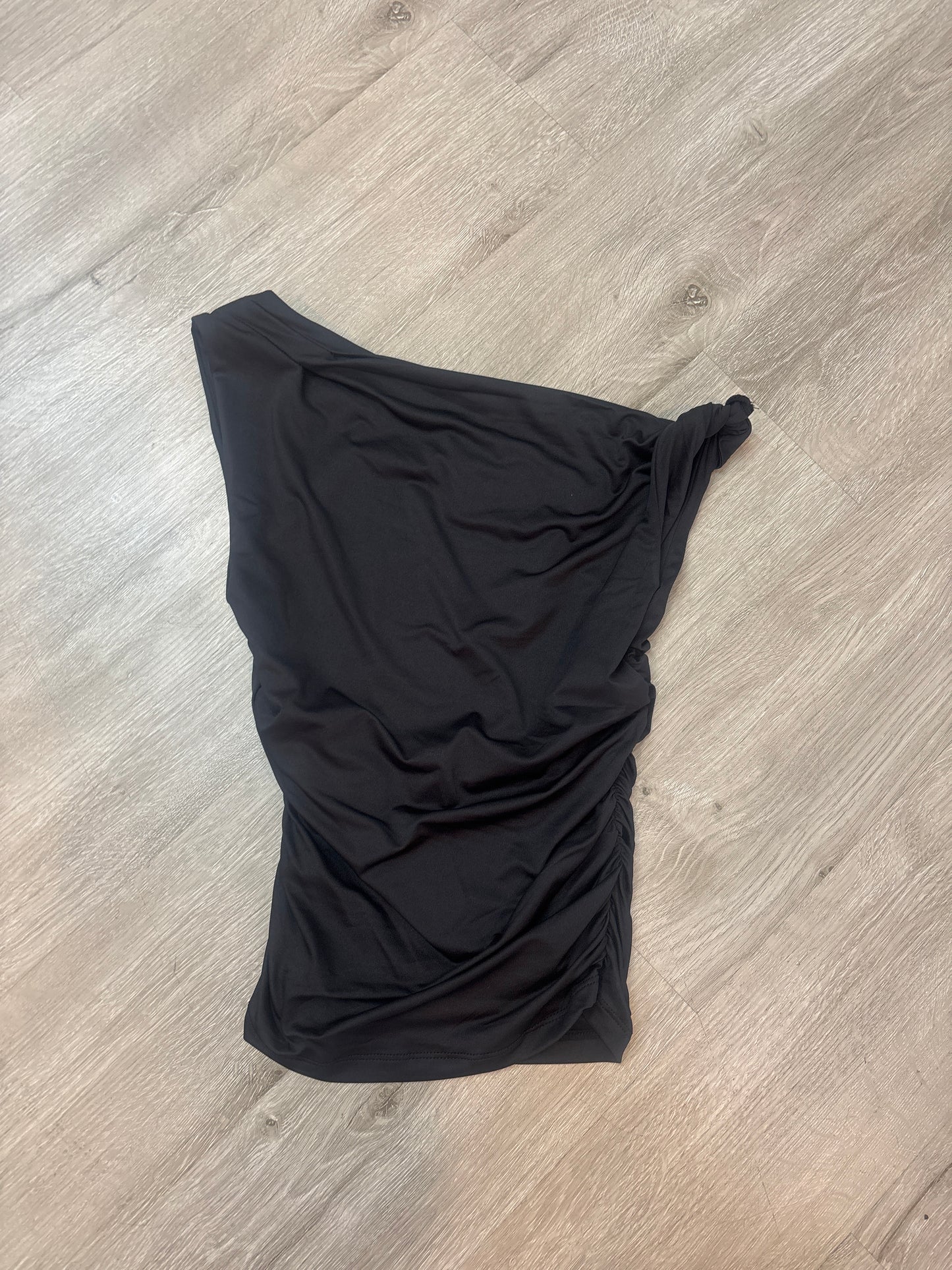 Leslie asymmetrical top